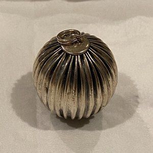 Sterling silver globe pendant.